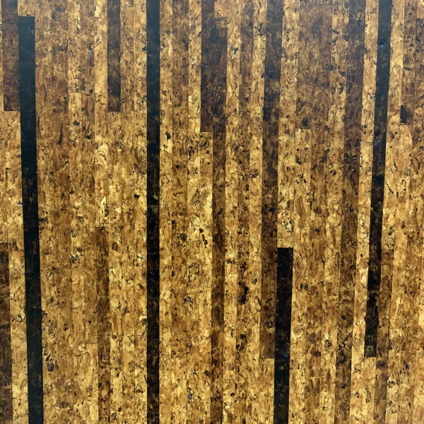 Cork floor tile with light and dark brown stripey pattern